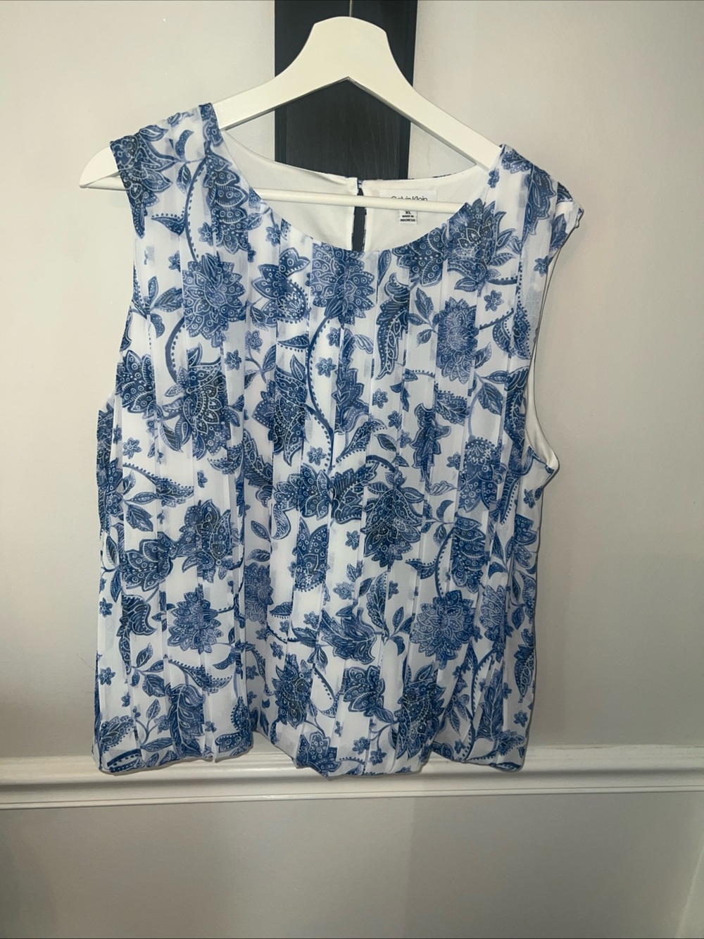 Calvin Klein White Sleeveless Blouse with Blue Floral Motif